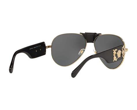 versace black & gold sunglasses mod 2150-q|Versace black and white purse.